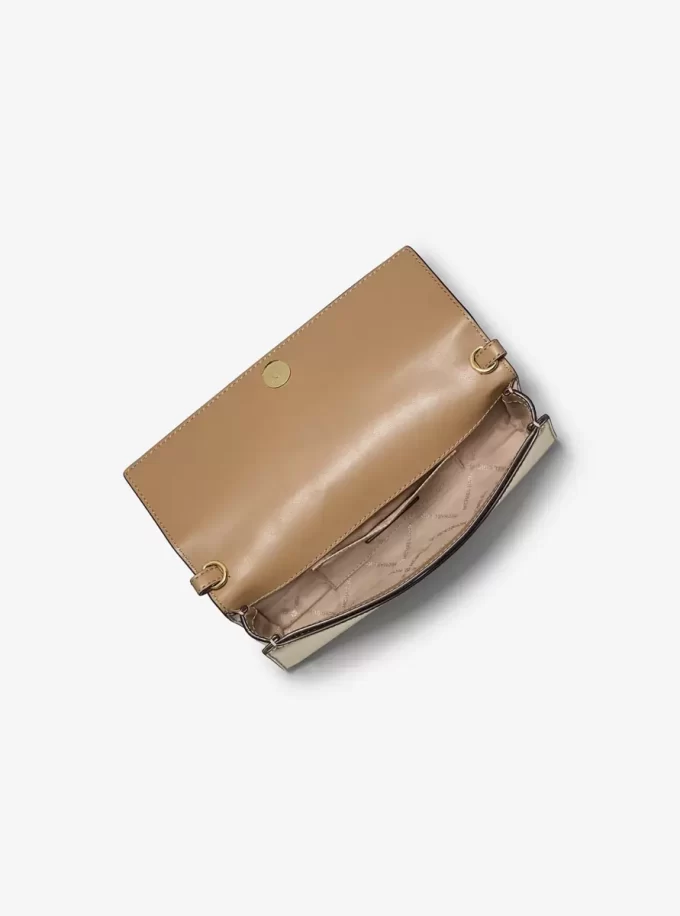 Clutch Jet Set Mediu din piele metalică Clutch Jet Set Mediu din piele metalică