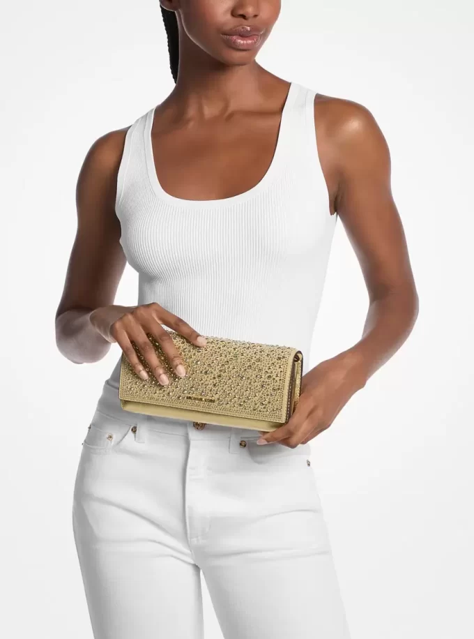 Clutch Jet Set Mediu din piele metalică Clutch Jet Set Mediu din piele metalică