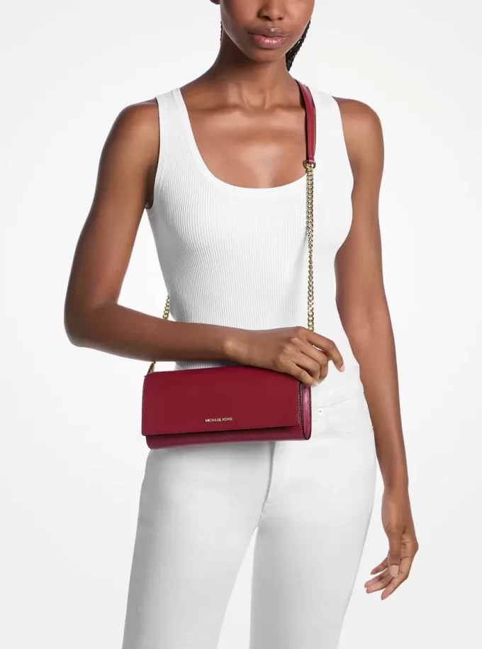 Clutch mediu din piele Jet Set Clutch mediu din piele Jet Set
