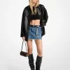 Fustă mini din denim zdrențuită Fustă mini din denim zdrențuită
