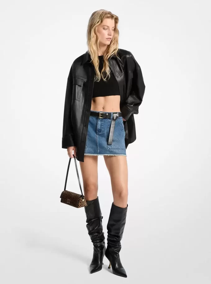 Fustă mini din denim zdrențuită Fustă mini din denim zdrențuită
