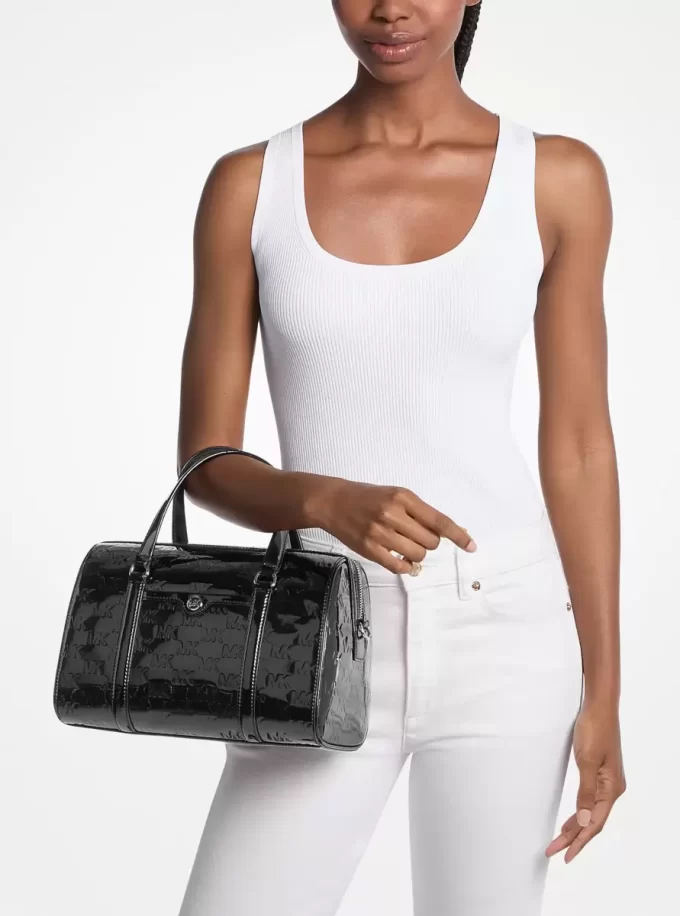 Geantă crossbody Jet Set medie cu logo în relief și logo patentat Geantă crossbody Jet Set medie cu logo în relief și logo patentat