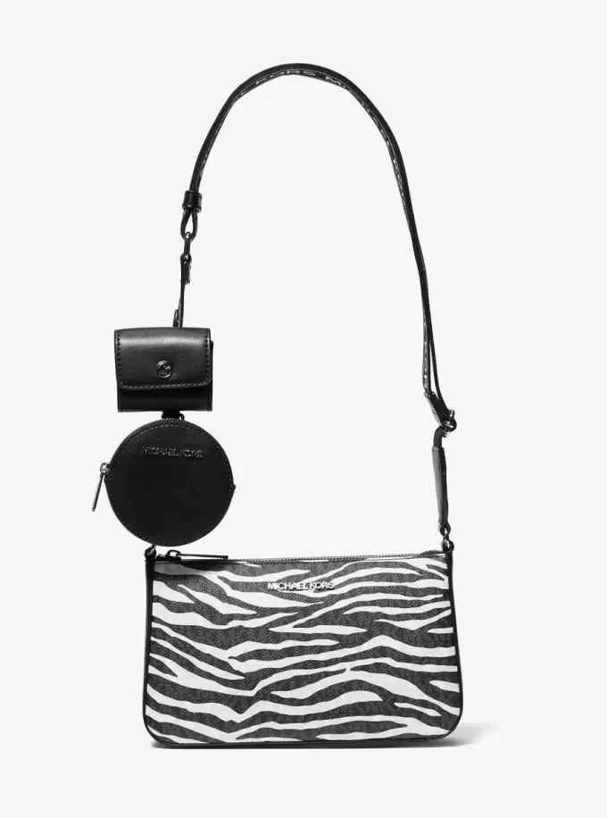 Geantă crossbody medie Jet Set din piele cu imprimeu animal și logo, cu husă pentru Apple Airpods Pro® Geantă crossbody medie Jet Set din piele cu imprimeu animal și logo, cu husă pentru Apple Airpods Pro®