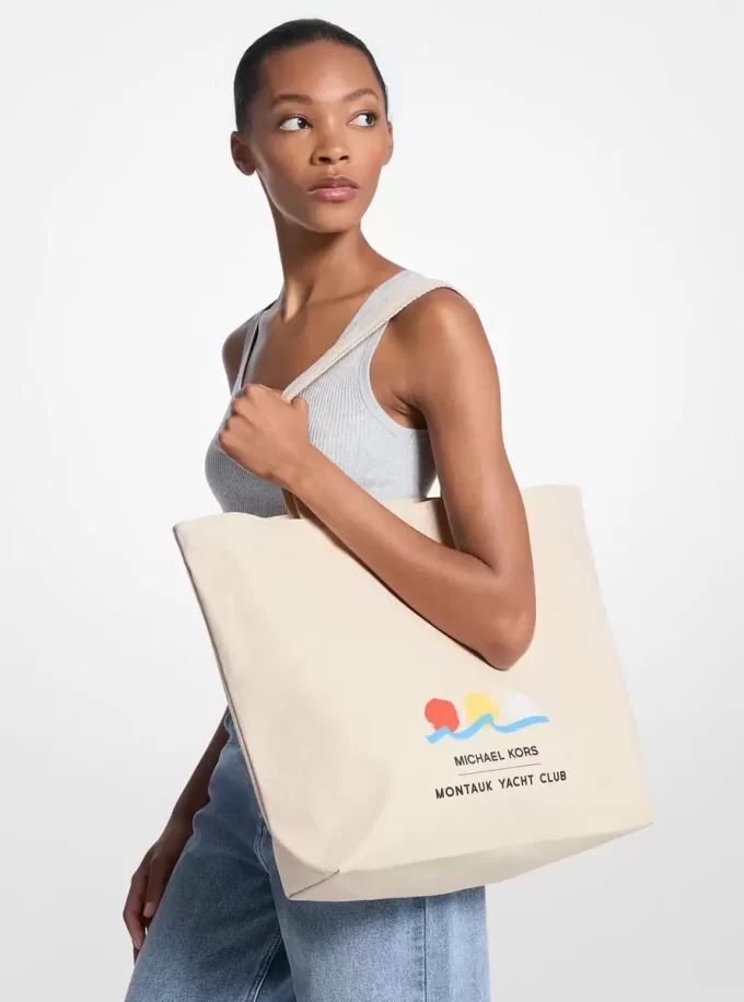 Geantă tote din pânză de bumbac Michael Kors x Montauk Yacht Club Geantă tote din pânză de bumbac Michael Kors x Montauk Yacht Club