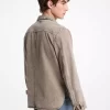 Jachetă tip cămașă din denim spălat cu tiv curbat Jachetă tip cămașă din denim spălat cu tiv curbat