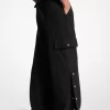 Pantaloni cargo cu croi larg și crep elastic Pantaloni cargo cu croi larg și crep elastic