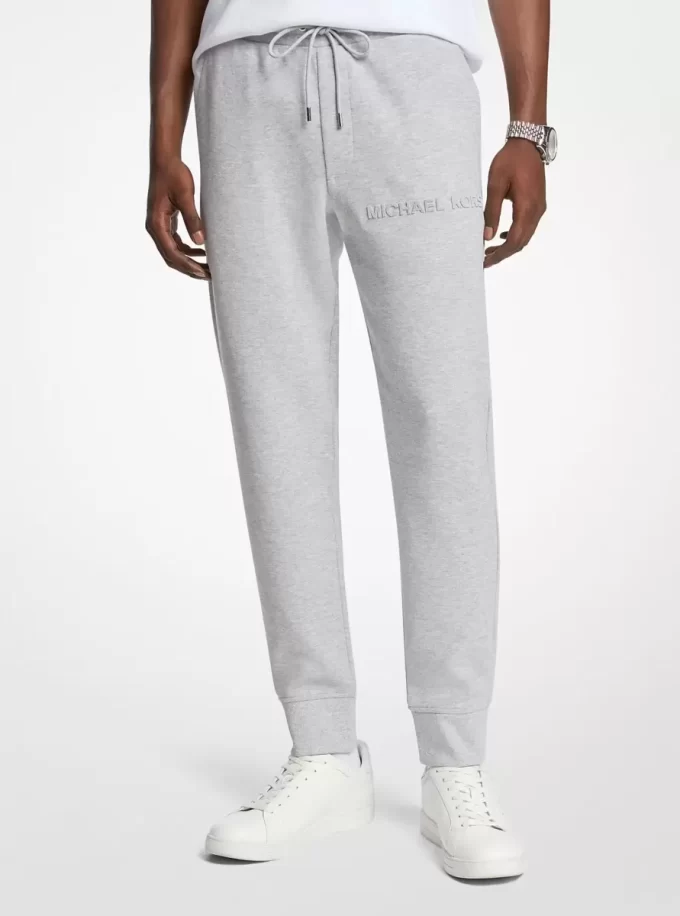 Pantaloni jogger din amestec de bumbac cu logo în relief Pantaloni jogger din amestec de bumbac cu logo în relief