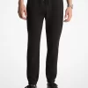 Pantaloni jogger din amestec de bumbac cu logo în relief Pantaloni jogger din amestec de bumbac cu logo în relief