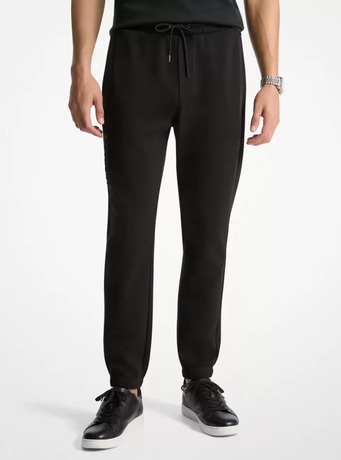 Pantaloni jogger din amestec de bumbac cu logo în relief Pantaloni jogger din amestec de bumbac cu logo în relief