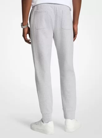 Pantaloni jogger din amestec de bumbac cu logo în relief