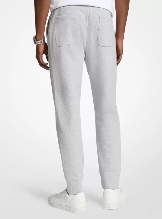 Pantaloni jogger din amestec de bumbac cu logo în relief Pantaloni jogger din amestec de bumbac cu logo în relief