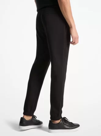 Pantaloni jogger din amestec de bumbac cu logo în relief Pantaloni jogger din amestec de bumbac cu logo în relief