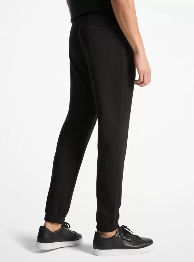 Pantaloni jogger din amestec de bumbac cu logo în relief Pantaloni jogger din amestec de bumbac cu logo în relief