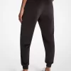 Pantaloni jogging din velur cu logo decorat