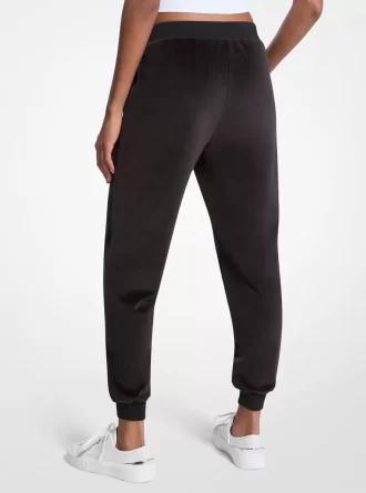 Pantaloni jogging din velur cu logo decorat