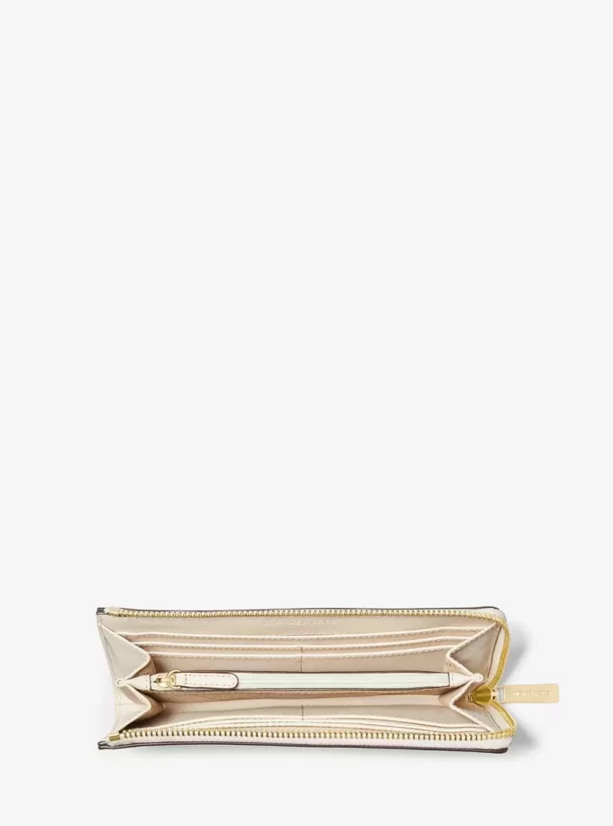Portofel mare Jet Set Travel din piele Saffiano cu fermoar pe un sfert Portofel mare Jet Set Travel din piele Saffiano cu fermoar pe un sfert