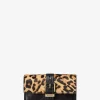 Portofel mediu Nolita cu imprimeu leopard și piele, pliabil în trei părți Portofel mediu Nolita cu imprimeu leopard și piele, pliabil în trei părți