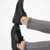 Tenișor din piele și logo Keating Tenișor din piele și logo Keating